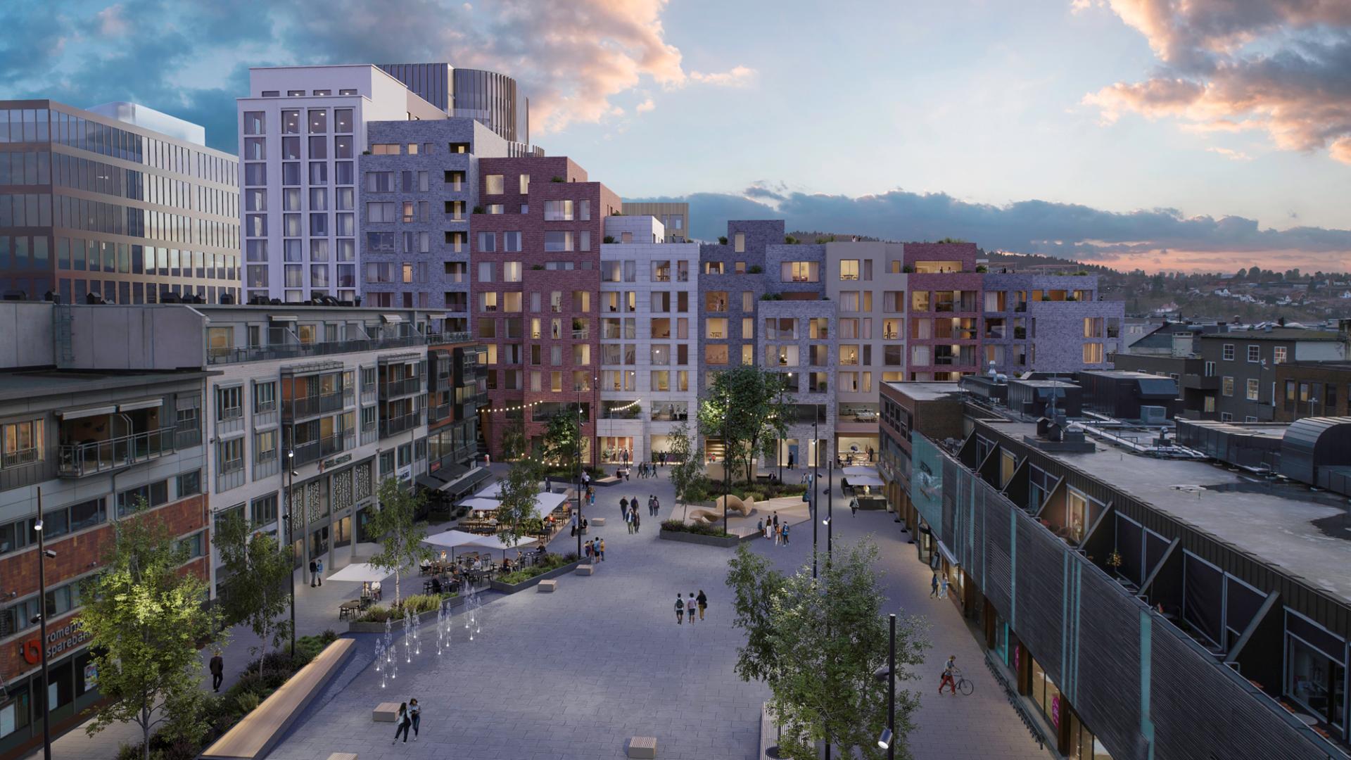 torg i forkant med høye bygg i bakkant