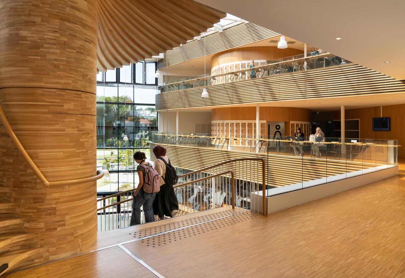 Wooden stairs and details from balconies with slat walls. Photo 