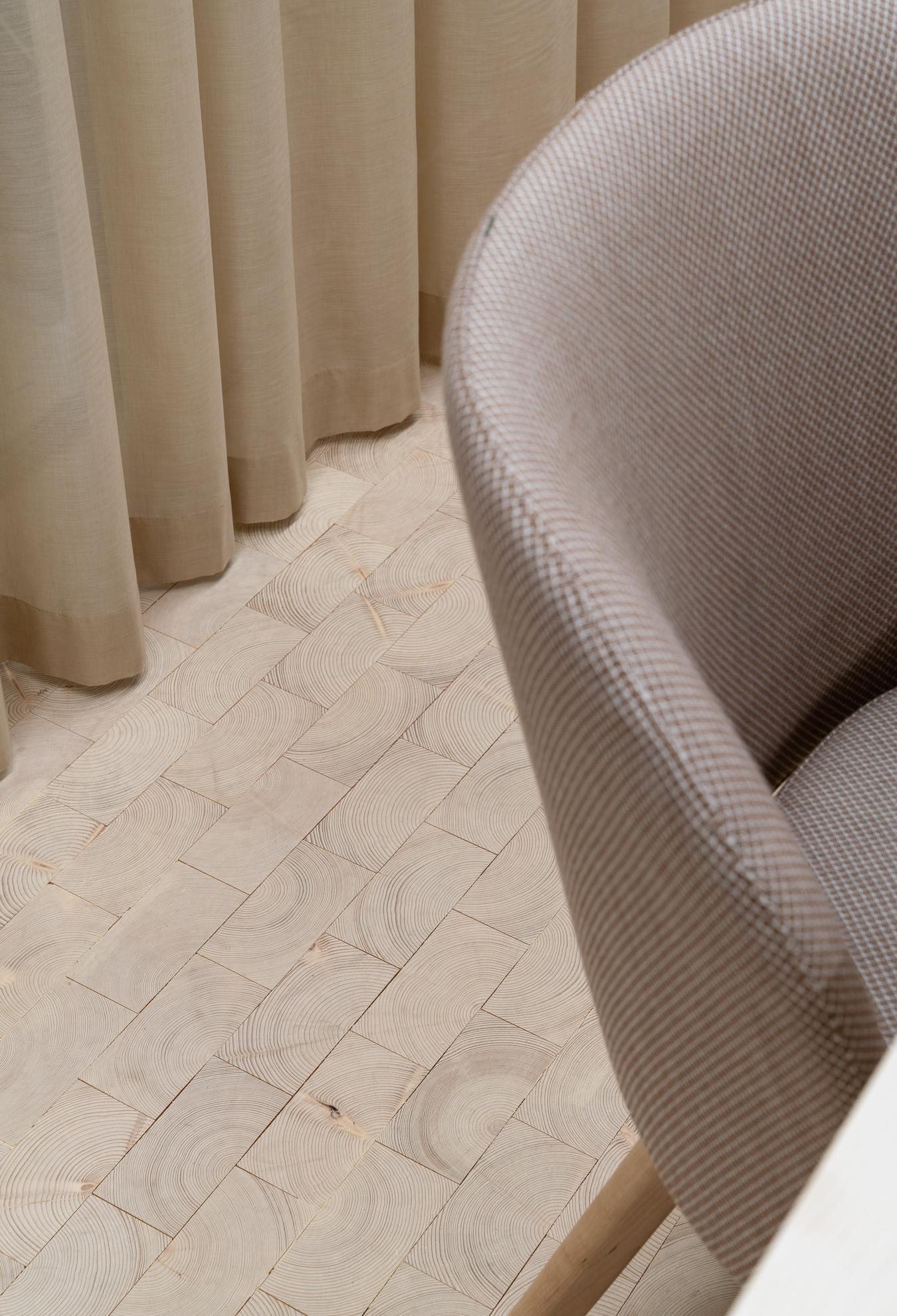 Detail of textiles and wooden floors. Photo