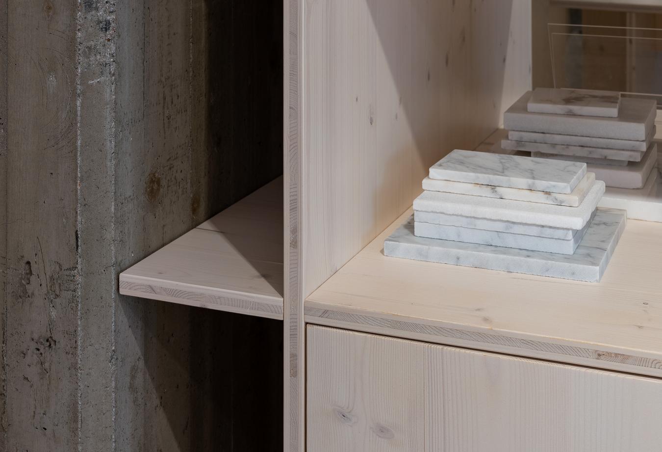 Space-built shelves in plywood. Photo