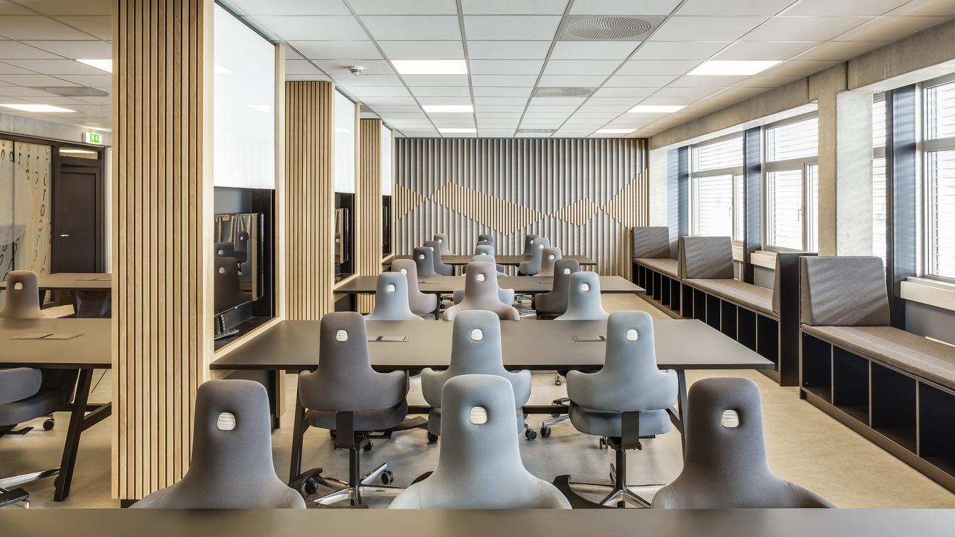 Workspace with table and office chairs. Photo